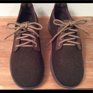 Earth dark green dyed sheep fur tennis shoes.